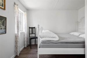 Llit o llits en una habitació de 4011-Stege-Klintevej-64