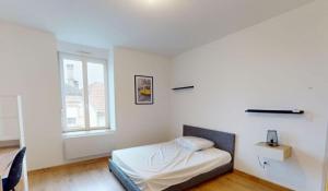 Postel nebo postele na pokoji v ubytování Appartement Moderne et Lumineux