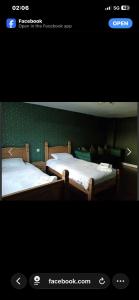 En eller flere senge i et værelse på Norfolk Arms Hotel Sheffield