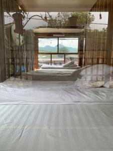 En eller flere senge i et værelse på Chiềng Đi Dreamy