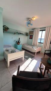 En eller flere senge i et værelse på Habitación en Condominio Terrazas del Sol