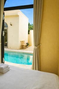 Swimmingpoolen hos eller tæt på Le Cosmos 2 Vĩnh Hy