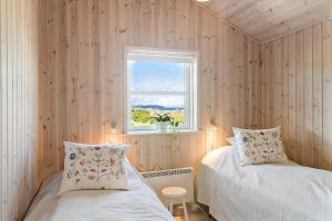 En eller flere senge i et værelse på HA354-Saeby-Kattegatsvej-5