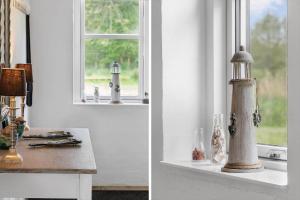 een kamer met een raam met een vuurtoren op een aanrecht bij HA375-Saeby-Kulmulevej-21 in Sæby +35 foto's