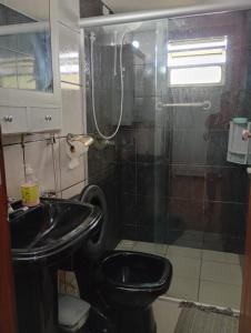 Et badeværelse på Apt 3 quartos sendo 1 suíte, zona sul de Ilhéus + 4 billeder