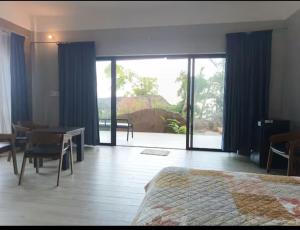 En eller flere senge i et værelse på Globiquex hotels, Phu quoc