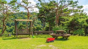 Vườn quanh Seokmodo supsokbadapunggyeong pension +7 ảnh