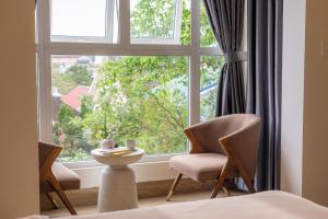 Posezení v ubytování An Mai Boutique Hotel