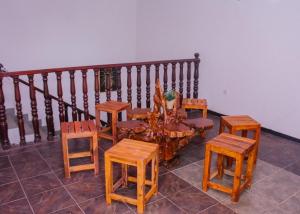a group of tables and stools in a room at #BEDBOX in Dambulla +31 photos