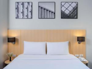 En eller flere senge i et værelse på Ibis Bangkok Sukhumvit 4
