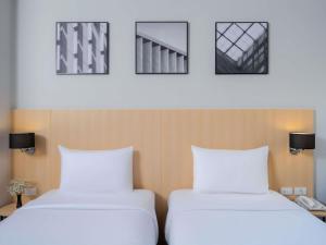 En eller flere senge i et værelse på Ibis Bangkok Sukhumvit 4 + 32 billeder