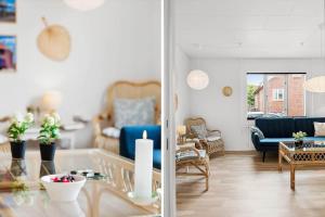 een woonkamer met een blauwe bank en een tafel bij 727-Thyboron-Magevej-10 in Thyborøn