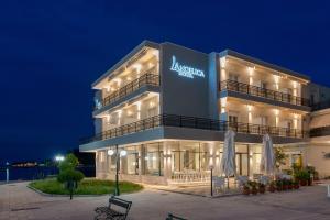 a night view of the akhtar hotel at Angelica Hotel in Limenas