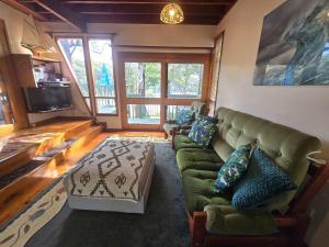 Et opholdsområde på Cottage on the Lake - peaceful Burrill Lake escape