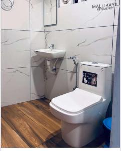 Et badeværelse på MALLIKAYIL Residency