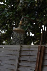 a broom is being used to clean some stairs at La Costa Shoal Bay in Shoal Bay