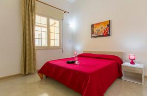 B&B Isole Dello Stagnone客房内的一张或多张床位