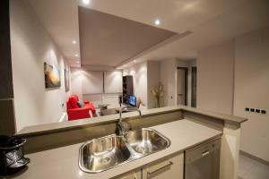 Kuchyň nebo kuchyňský kout v ubytování WinTuWin Apartments + 37 fotografií