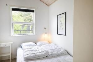 En eller flere senge i et værelse på 13303-Asnaes-Hove-Straede-42-D + 22 billeder