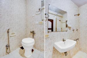 Koupelna v ubytování Super Townhouse Calangute Formerly Hotel Horizon