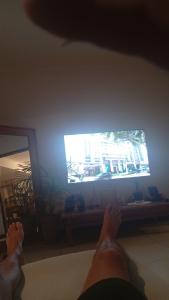 TV a/nebo společenská místnost v ubytování Pousada Recanto da Mata