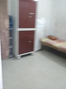 a blurry picture of a room with a bed at josh poonam in Prayagraj