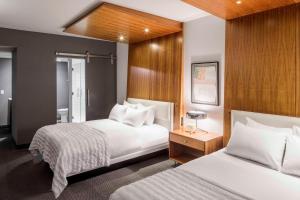 Postel nebo postele na pokoji v ubytování Le Meridien Columbus, The Joseph