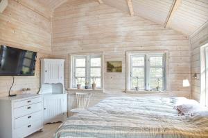 En eller flere senge i et værelse på 10061-1-Rorvig-Lindegardsvaenget-5