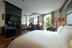 Voodi või voodid majutusasutuse La Nueva Boutique Hotel Hanoi & Spa toas