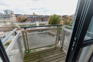 a balcony with a view of a city at Hullidays - King & Queen Ensuite in Hull