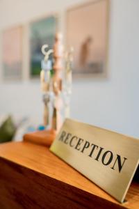 a sign that says appreciation sitting on top of a table at Alankara Retreats Colombo 07 in Colombo