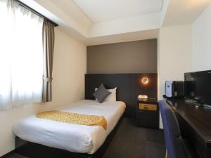 Postel nebo postele na pokoji v ubytování Hotel Sunplaza Osaka Sakai Annex + 20 fotografií