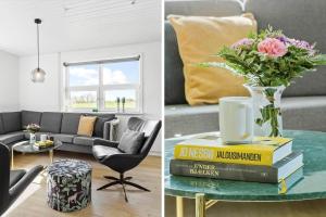 - un salon avec un canapé et une table ornée d'un vase de fleurs dans l'établissement LF14145-Spottrup-Uglkaeret-5, à Spottrup