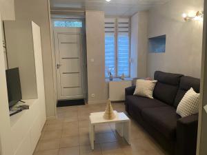 Posezení v ubytování À l'improviste est une maison individuelle