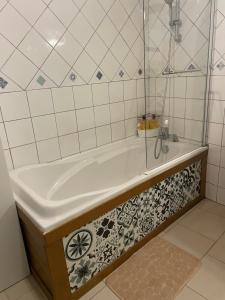 Koupelna v ubytování À l'improviste est une maison individuelle