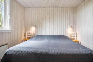 En eller flere senge i et værelse på LF13172-Nykobing-M-Strandvaenget-76