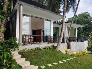 a villa with a view of the house at Oasi house in Unawatuna