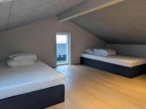 En eller flere senge i et værelse på LF12742-Vinderup-Kildebakken-42