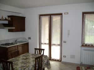 Kuchyň nebo kuchyňský kout v ubytování La Collina Del Sagrantino + 26 fotografií