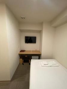 TV a/nebo společenská místnost v ubytování Hopetree OSAKA GRAND