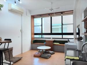 Et opholdsområde på Haian Corner Homestay