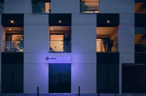 a facade of a building with the name nasa on it at Aweso Limassol in Limassol +44 photos