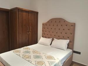 En eller flere senge i et værelse på Lavania Ocean View Residencies + 16 billeder