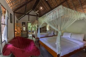 Postel nebo postele na pokoji v ubytování Nary Garden