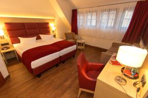 Postel nebo postele na pokoji v ubytování Hotel Kreller + 17 fotografií