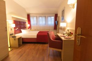 Postel nebo postele na pokoji v ubytování Hotel Kreller