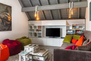 Posezení v ubytování Kent Cottage