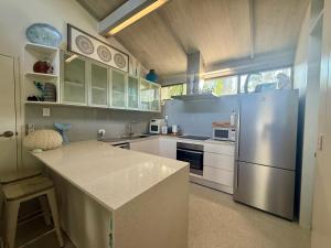 Køkken eller tekøkken på Nautilus Beach Resort by Charlesworth