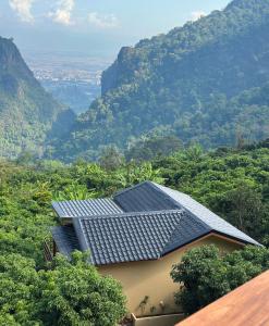 a house with solar panels on top of a mountain at Sayu Homestay&Cafe in Ban Pha Mi +20 photos