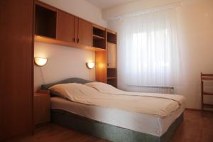 Posteľ alebo postele v izbe v ubytovaní Apartment Rude